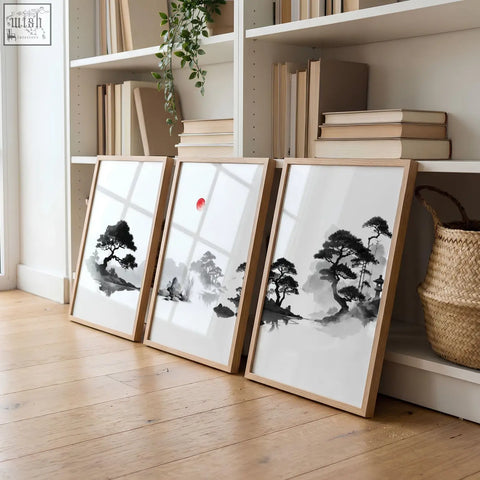 Three framed black and white japandi zen landscape prints with red sun in light wood frames perfect living room picture