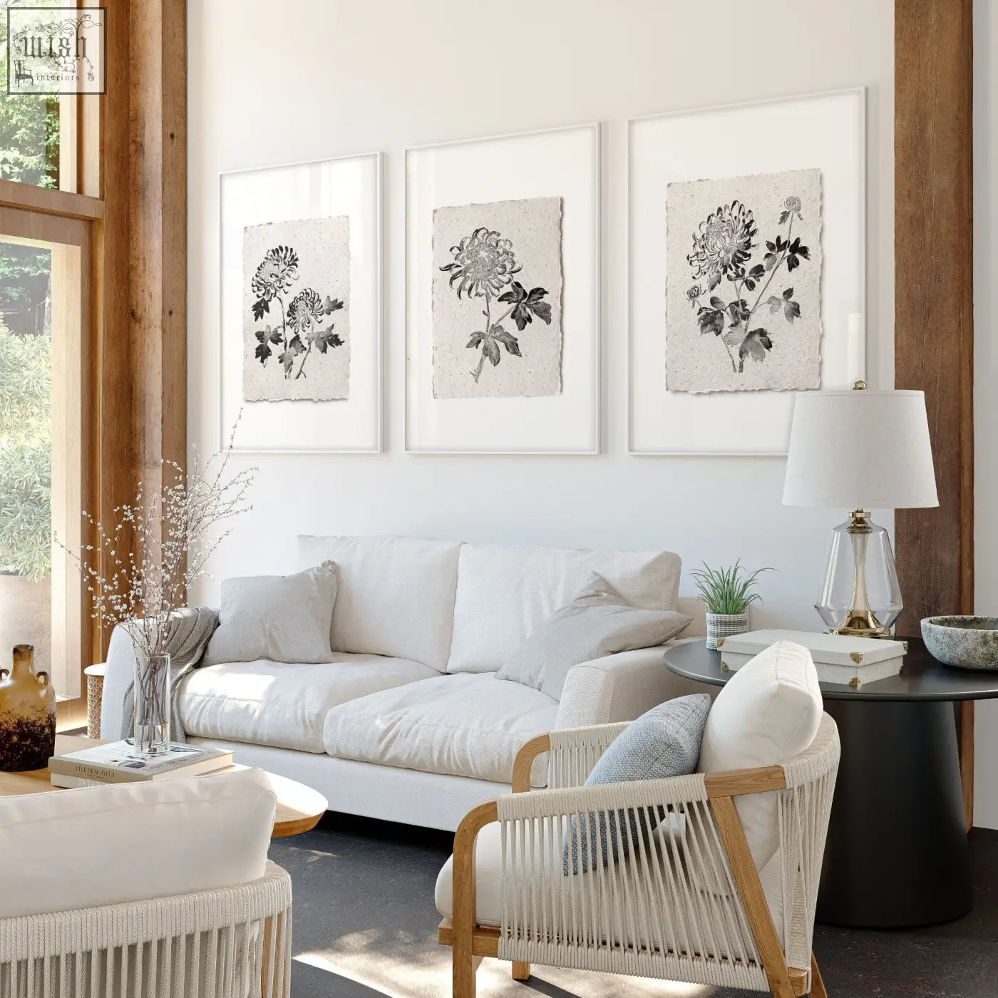 White woven wicker armchair with light wood frame perfect for living room with botanical chrysanthemum prints set