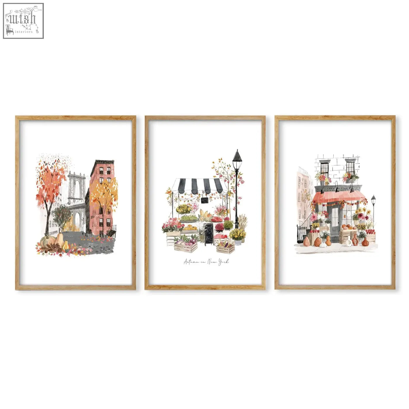 Set of three framed autumn in new york watercolor prints with light wood frames and white matting for living room wall art