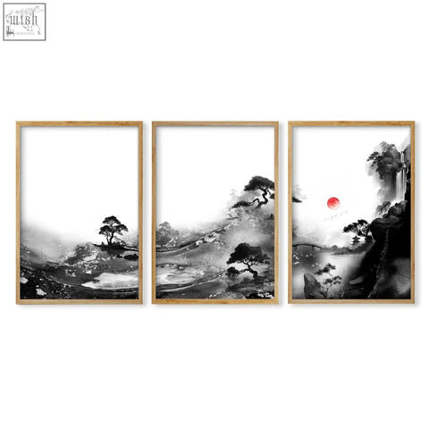 Set of three black and white japanese ink landscape prints with red sun in light wood frames perfect for living room wall art