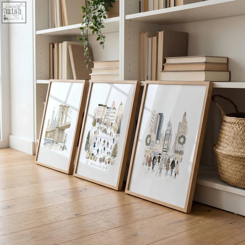Three framed beige watercolor nyc cityscape prints with light wood frames perfect for living room wall art decor