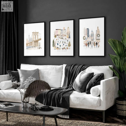 White sofa with black and gray pillows and dark gray blanket under beige NYC winter in New york living room wall art set