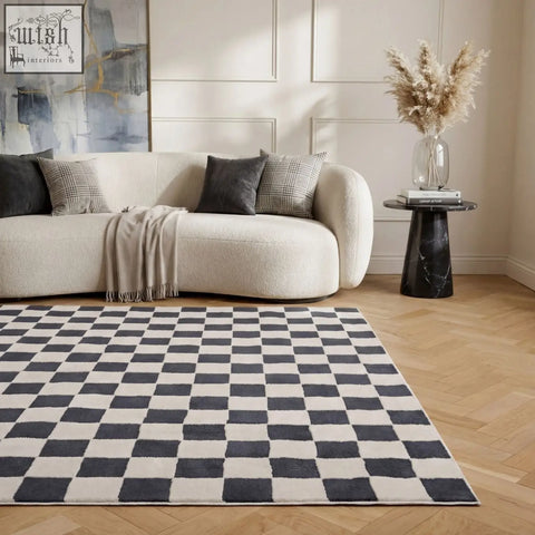 A plush soft textured loft checkerboard blue rug with black and white checkered pattern for cozy spaces