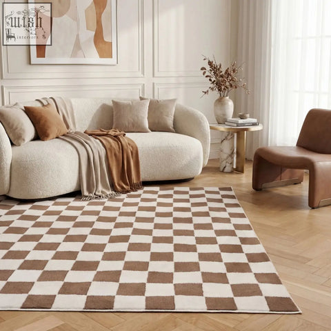 A beige and brown soft textured area rug with a checkered pattern called loft checkerboard brown rug