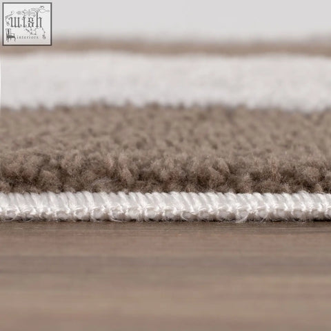 Beige and white striped loft checkerboard brown rug with plush textured surface and neatly finished edges