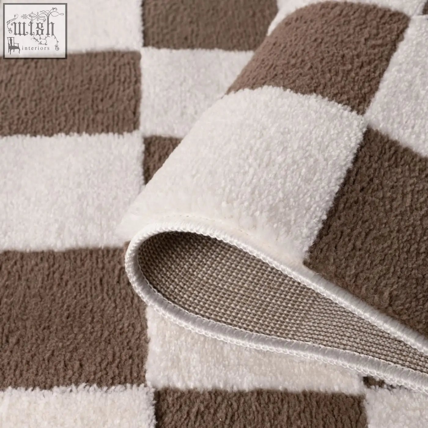 A plush loft checkerboard brown rug with soft terry cloth texture in white and brown checkerboard pattern