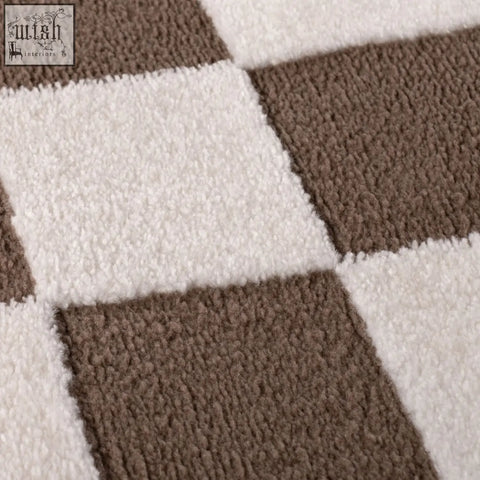 Brown and white plush loft checkerboard brown rug with a soft textured surface and cozy checkerboard pattern