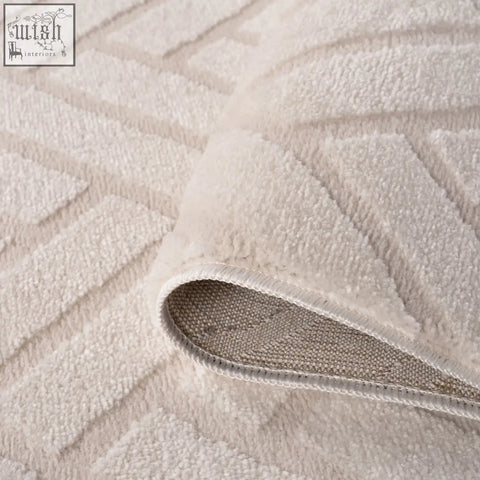 Beige plush chevron cream rug with soft textured surface and subtle geometric pattern for cozy living spaces