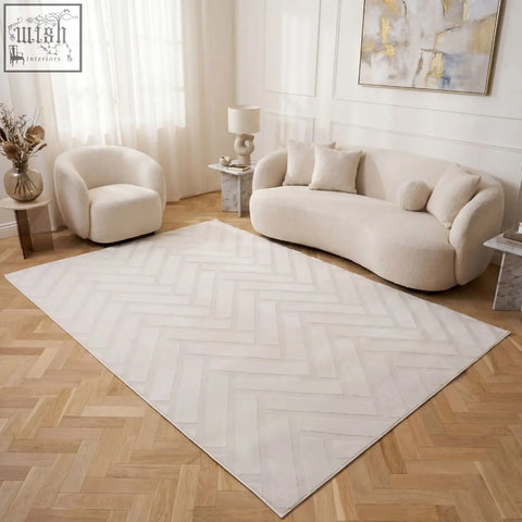Soft plush cream rug with herringbone chevron cream pattern perfect for cozy loft spaces