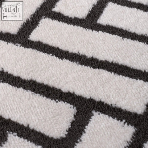 A plush loft chevron dark grey rug with a soft textured surface and a white and black geometric pattern