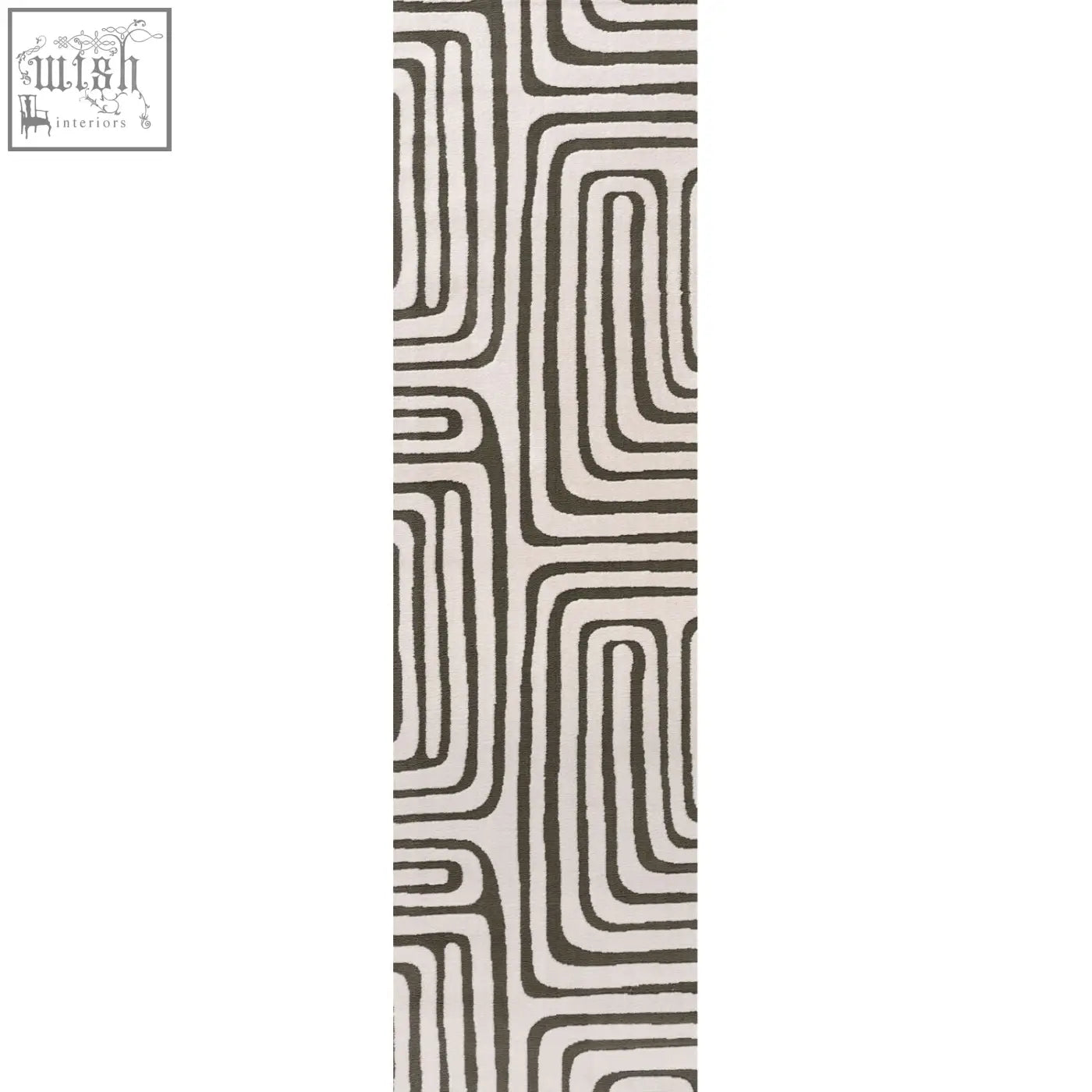 A long rectangular loft geometric green rug with bold black and cream abstract lines and a modern pattern