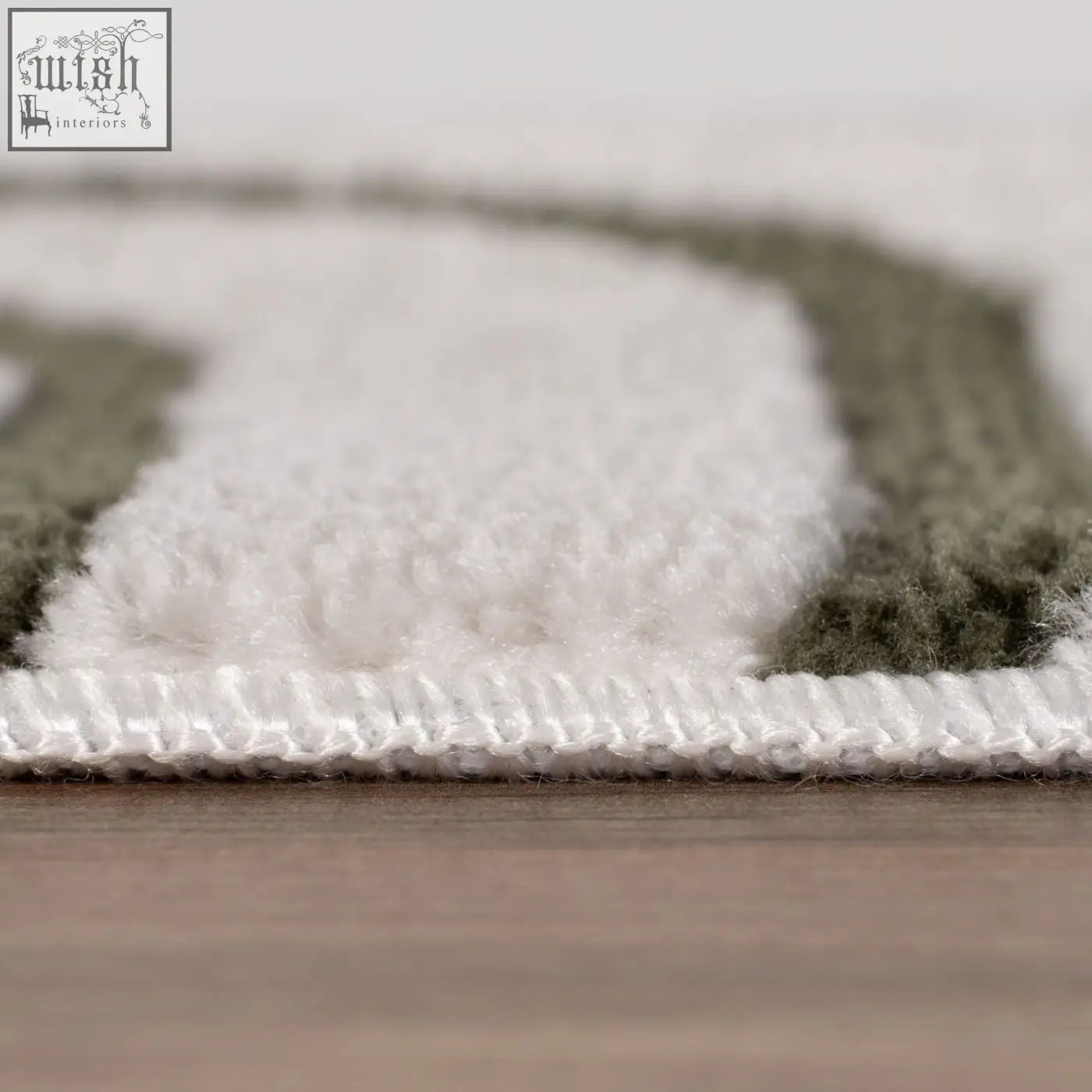 Loft geometric green rug with white and olive green plush looped pile finish for cozy stylish spaces