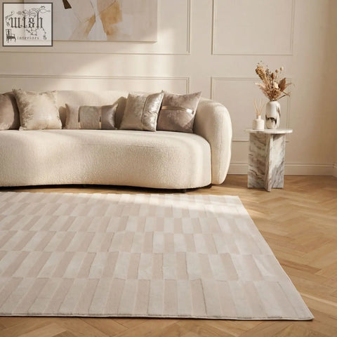 Beige rectangular loft striped cream rug with subtle geometric pattern of alternating light and darker beige stripes