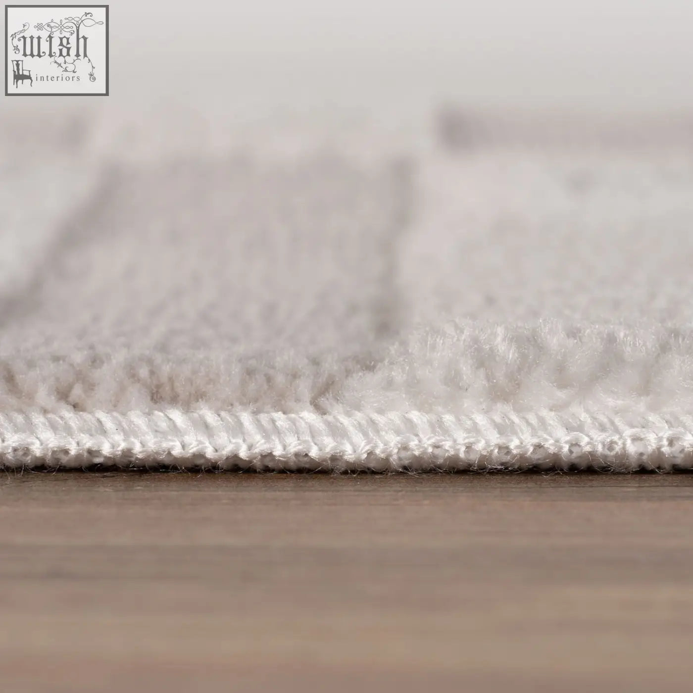 White plush loft striped cream rug with soft textured surface and neatly finished edge for cozy spaces