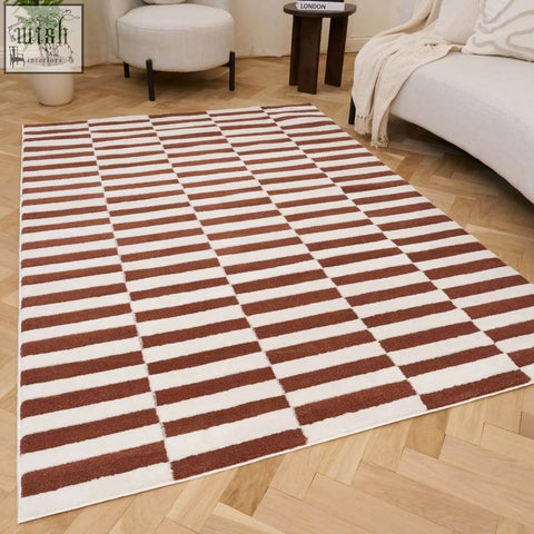 Loft striped terra rug with bold brown and white horizontal stripes on a light wood floor for cozy spaces