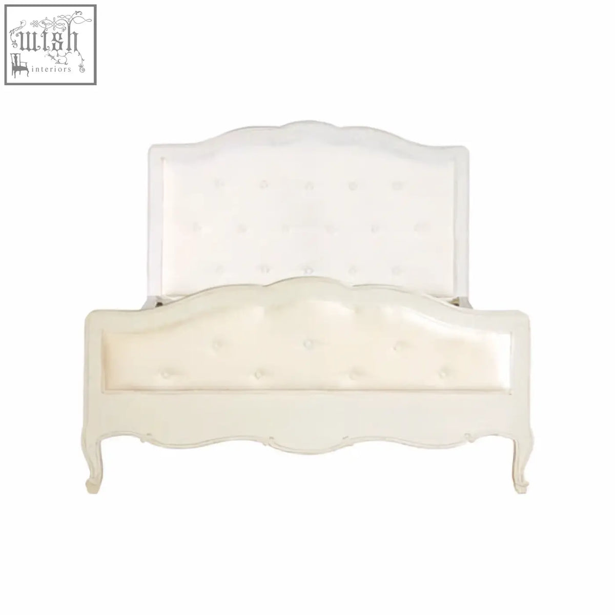 White double bed with tufted white upholstery, curved ornate legs, and matching headboard in Loire style