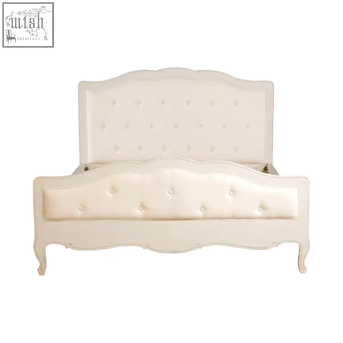 Cream-colored tufted loire white kingsize bed with ornate curved legs made from bayur wood in classic style