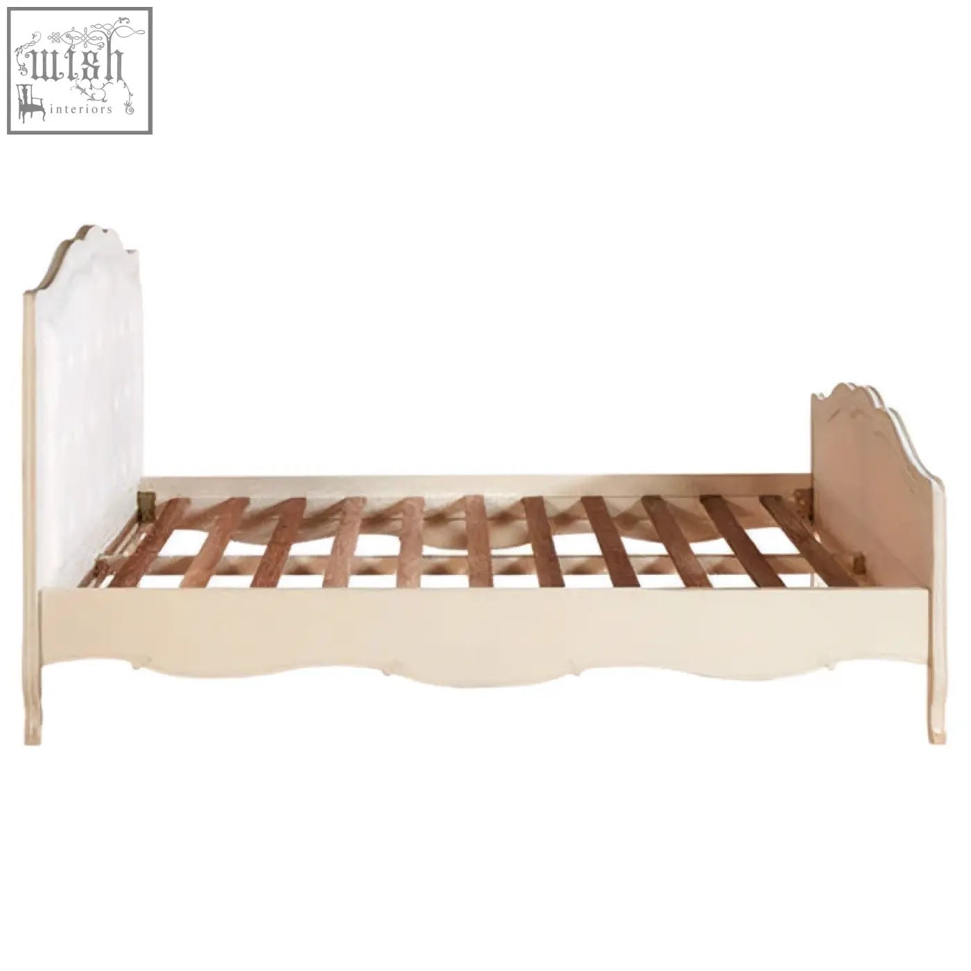 Cream-colored loire white kingsize bed with curved ornate bayur wood headboard and footboard white kingsize bed