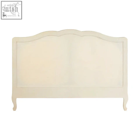 Cream-colored bayur wood headboard with curved top and ornate legs for loire white kingsize white kingsize bed