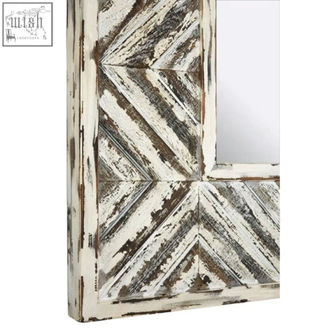 Rustic lombok wall mirror with white and dark wood frame and distressed chevron pattern perfect for any wall mirror setup