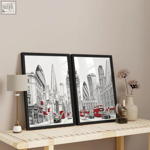 Black-framed london abstract art prints featuring minimalist black white and red city skyline with iconic buildings and buses