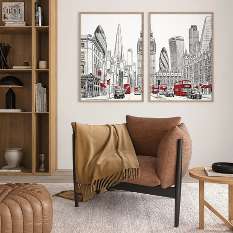 Two framed black white and red london abstract art prints featuring london skyline with double decker buses and landmarks