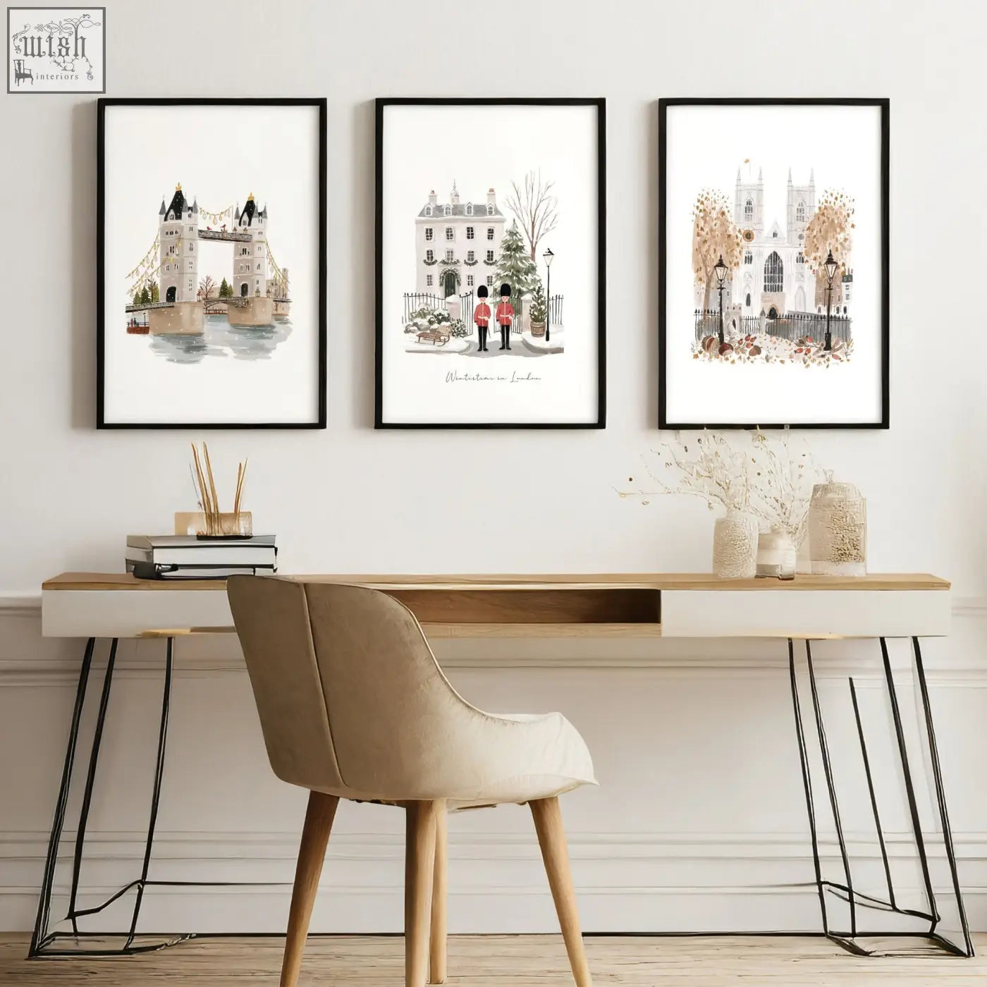 Set of three london art prints featuring wintertime landmarks in soft earth tones with sleek black frames wall art