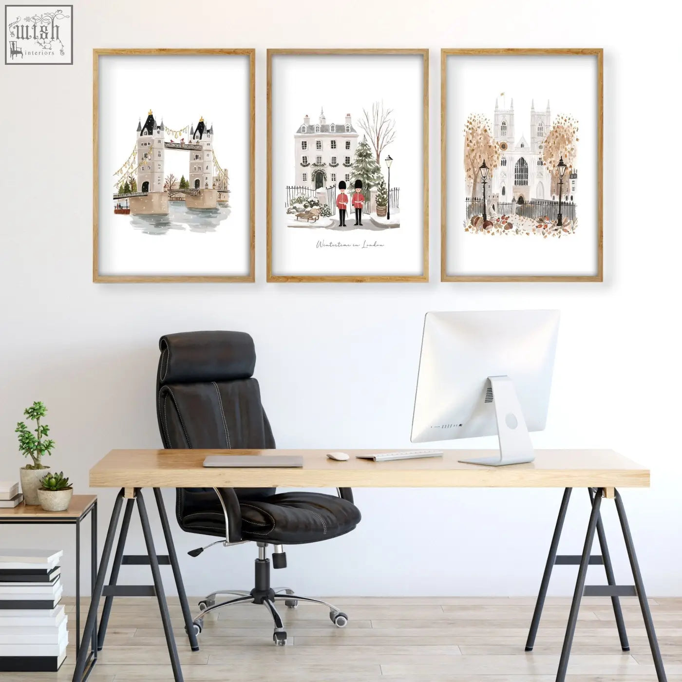 Three framed london art prints featuring wintertime landmarks in light wood frames perfect for wall art decor