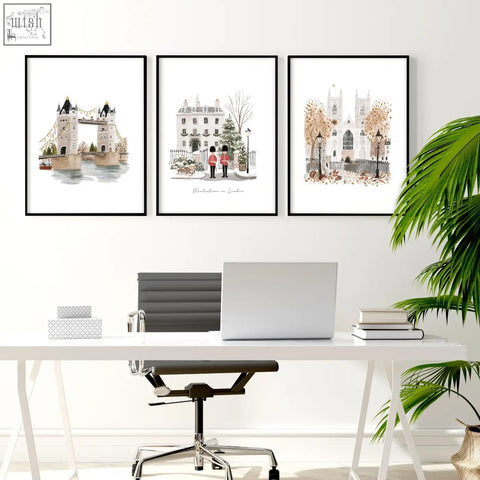 Three framed london art prints in muted pastels and sepia tones perfect as wall art for travel lovers
