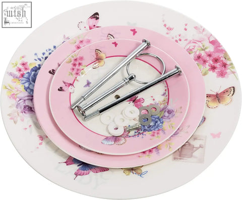 Pink floral ceramic tiered cake stand with silver metal rods from london boutique for shabby chic afternoon tea