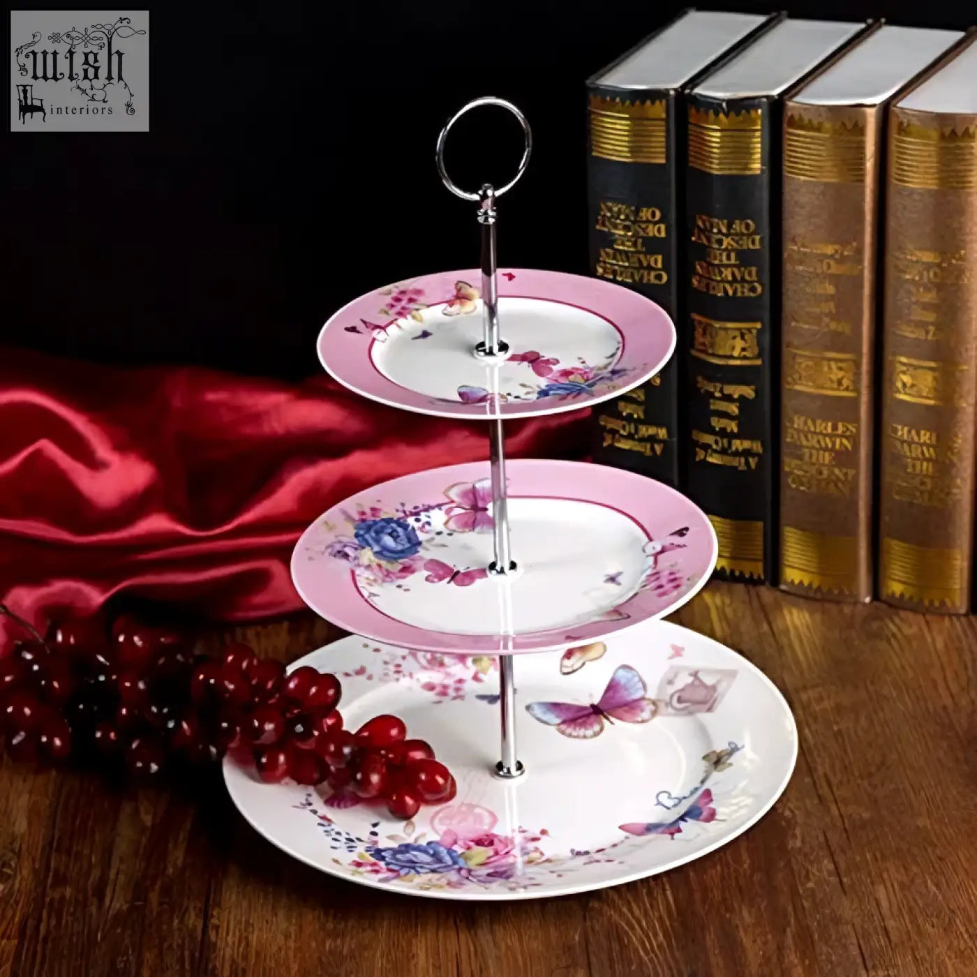 Three-tiered london boutique cake stand with pink white floral butterfly porcelain and silver metal frame in gift box