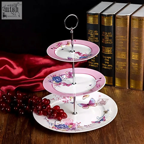 Three-tiered london boutique cake stand with pink white floral butterfly porcelain and silver metal frame in gift box