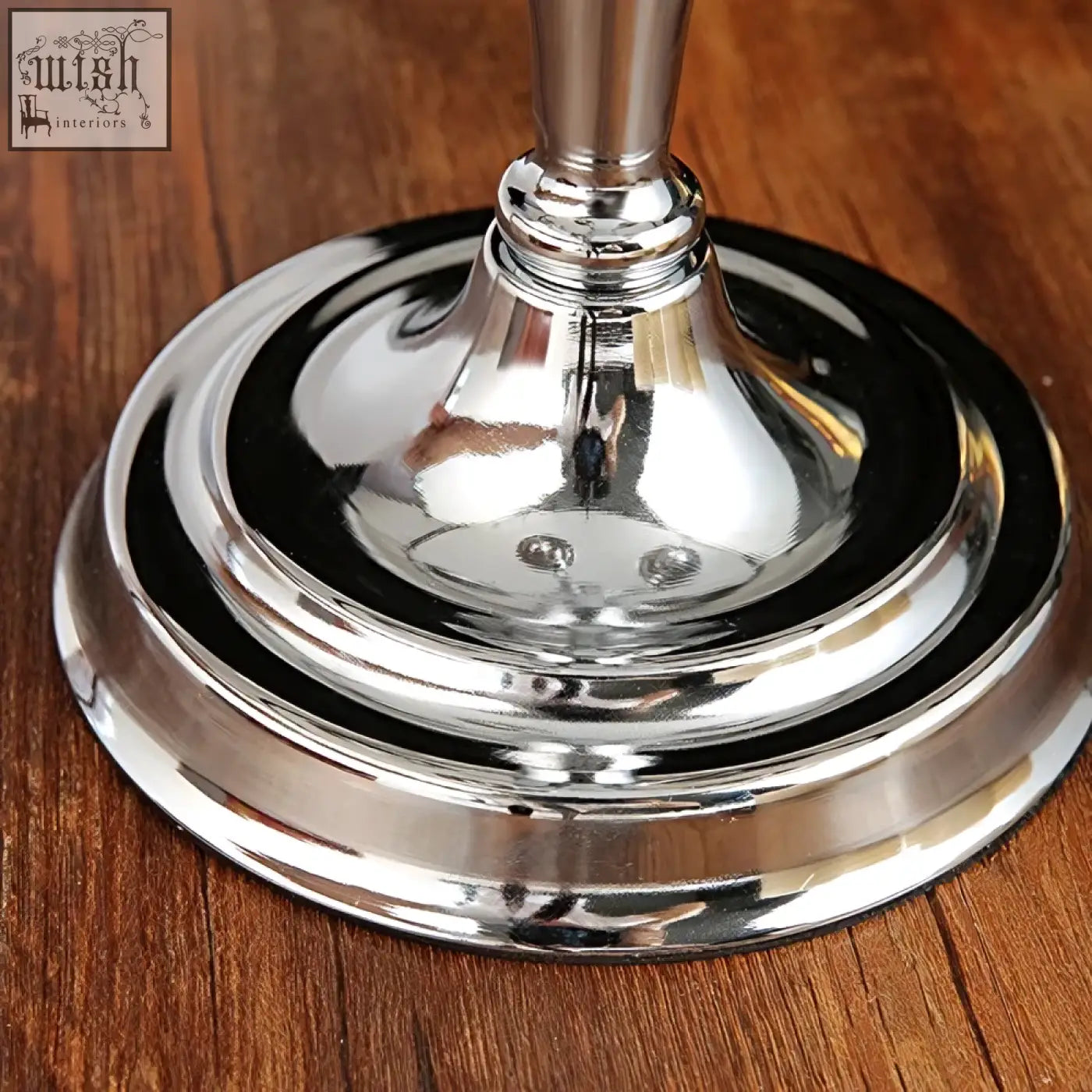 Shiny chrome solid brass london boutique arms candelabra with fluted tiered base and slender stem centerpiece