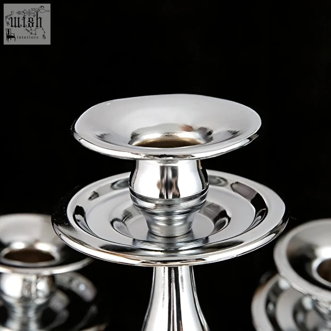 Shiny silver solid brass arms candelabra from london boutique with flared bowl and tiered base for weddings and gifts