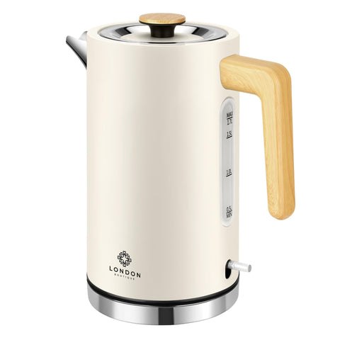 Cream-colored london boutique electric kettle with bamboo handle stainless steel base and measurement markings for fast boil