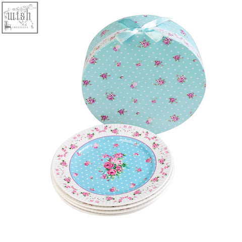 Stack of four london boutique rose blue dessert plates with pink rose patterns in a matching round box with ribbon