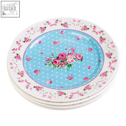 Stack of four london boutique rose blue ceramic dessert plates with pink roses and white polka dots 7 inches wide