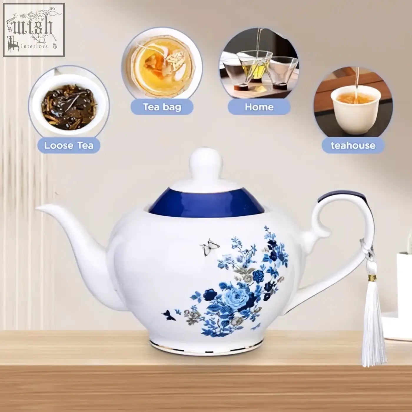 White ceramic london boutique teapot with rose butterfly navy loose tea infuser and blue lid rim gold edge trim