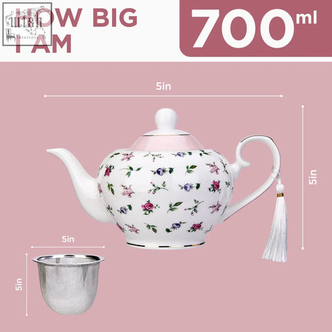White porcelain london boutique teapot with loose tea infuser pink floral pattern gold edge trim and easy grab handle