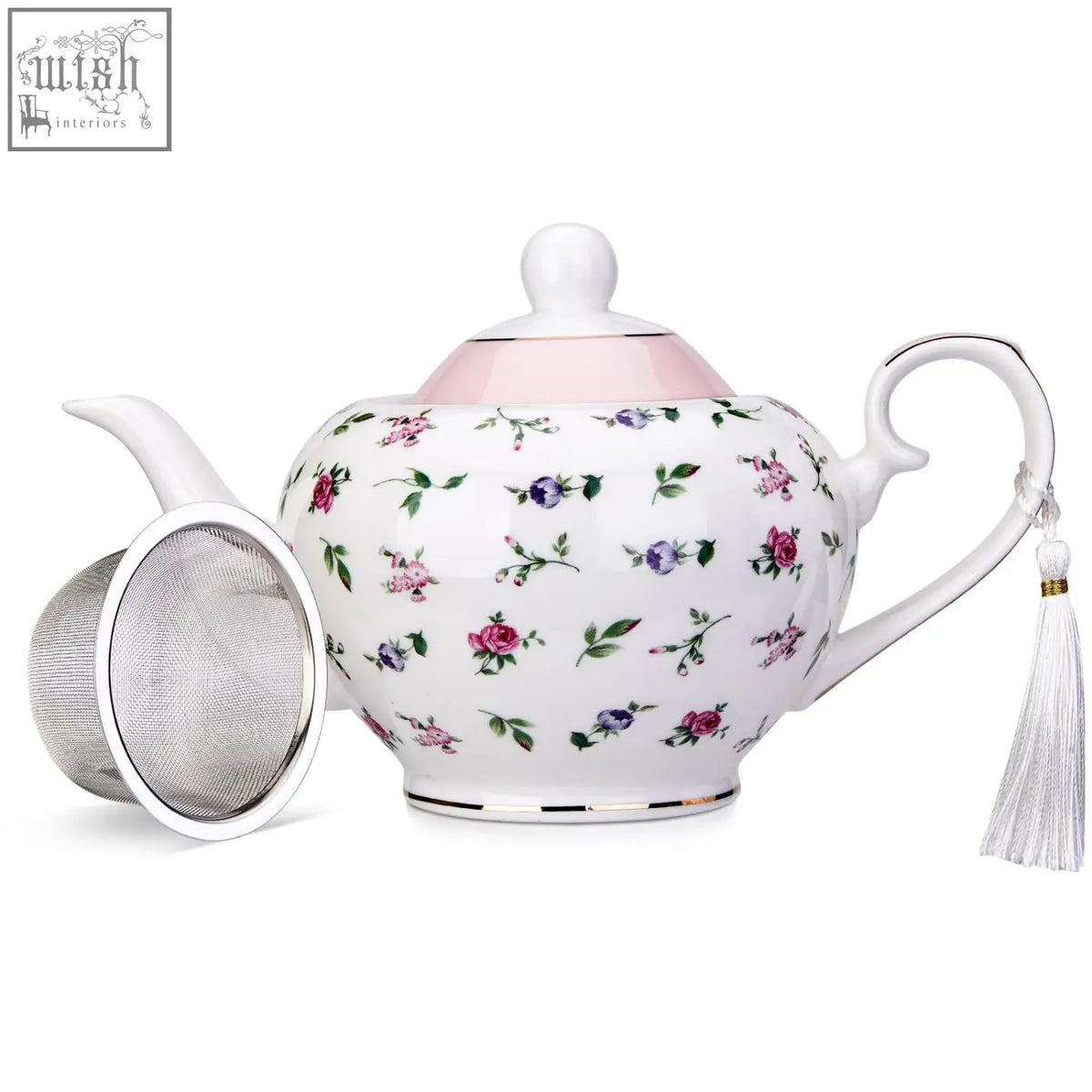 Delicate white porcelain london boutique teapot with loose tea infuser soft floral design gold edge trim and easy grab handle