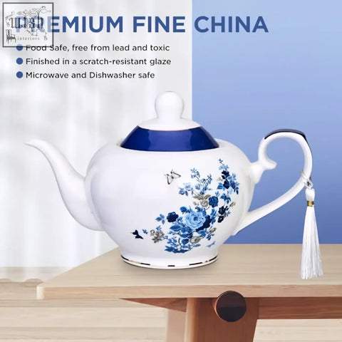 White porcelain london boutique teapot with infuser rose butterfly navy floral pattern and gold edge trim for loose tea