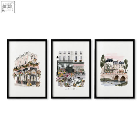 Set of three black-framed london poster art prints featuring pastel floral cityscape watercolor wall art