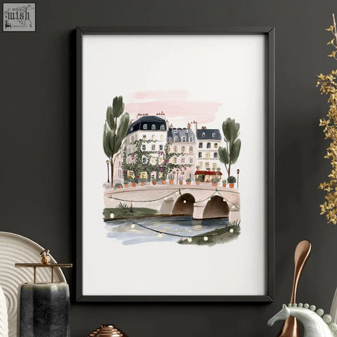 Black-framed london poster watercolor art print showing parisian street scene with buildings trees and river bridge wall art