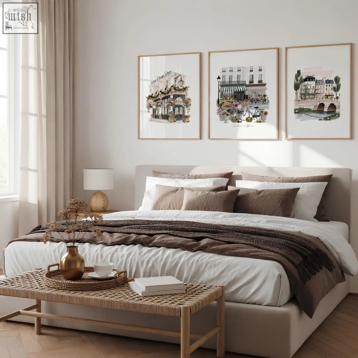 Gold-toned ceramic vase with slender neck on woven rattan tray paired with london poster floral wall art prints set