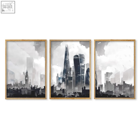 Set of three london prints featuring moody grey london skyline in black and white with light wood frames