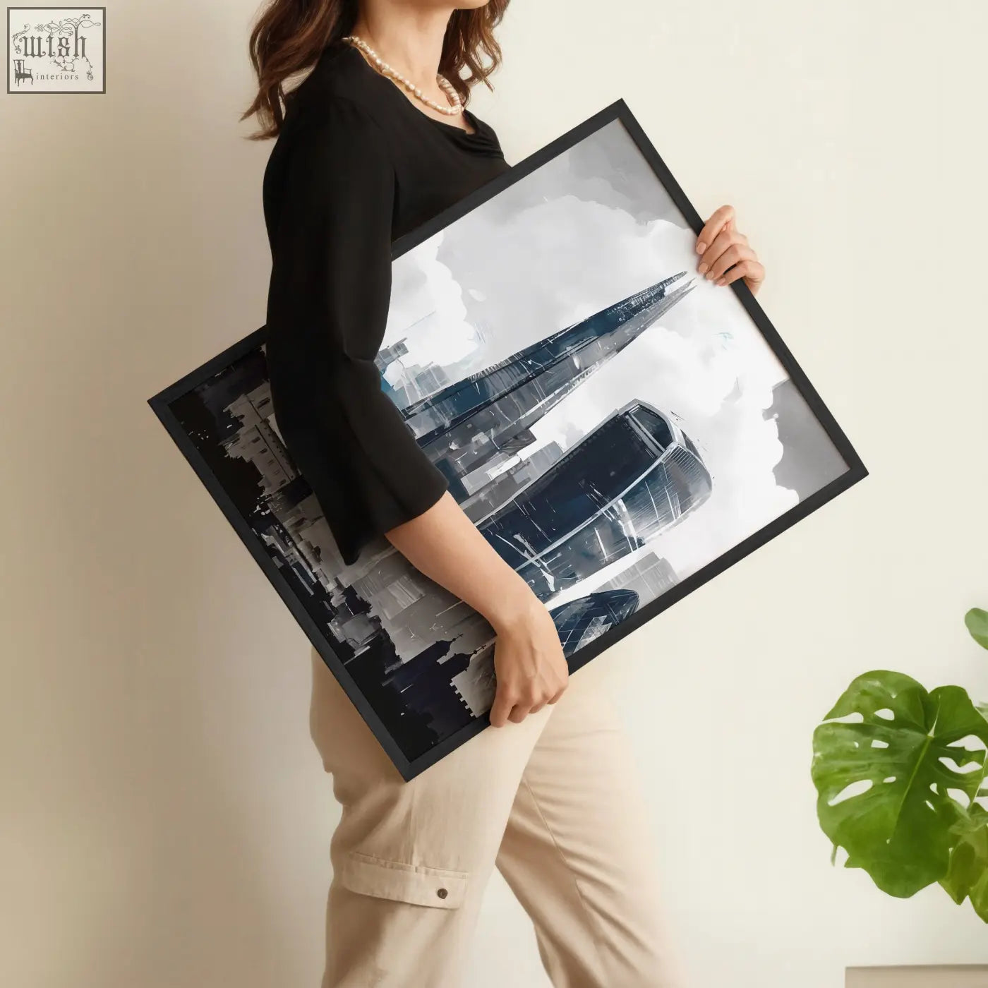 Black-framed london prints featuring moody grey skyline with the shard gherkin and a bus in three prints set