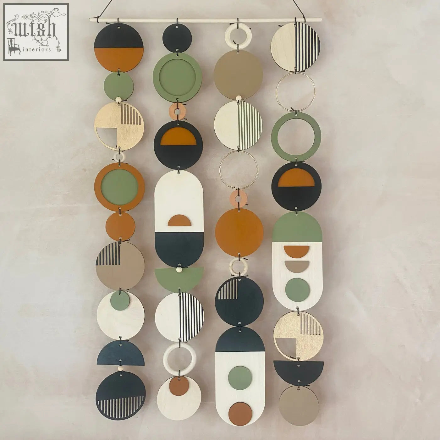 Modern geometric wall art with hand painted engraved layered ovals in olive green terracotta navy cream and beige tones