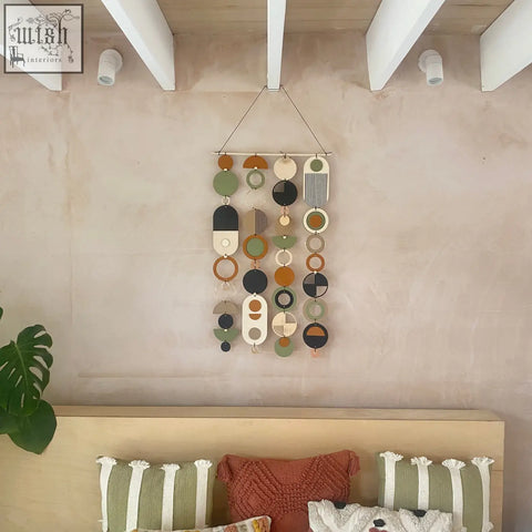 Modern geometric wall art with layered circular shapes in earthy tones hand painted and perfect for minimal home decor