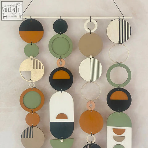 Modern hand painted wall art with geometric oval shapes in earthy tones for minimal home decor and new home trends