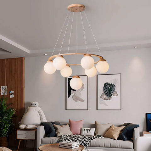 Modern minimalist pendant light lonian light with a circular wooden frame and seven frosted glass globe bulbs